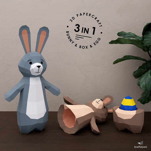 3-in-1 Easter papercraft set featuring a standing bunny paper sculpture, a bunny-shaped treat box, and a low poly decorative egg.