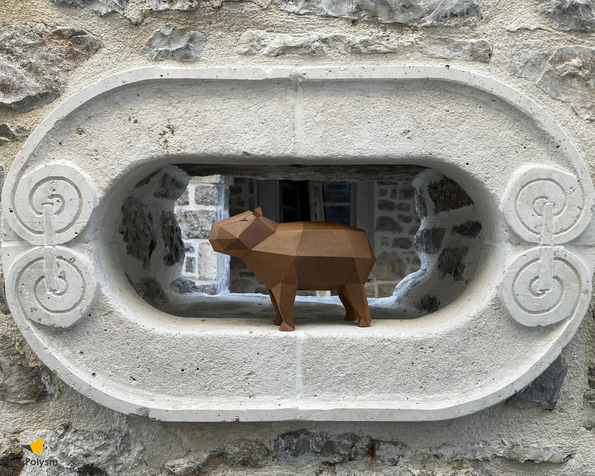 Capybara animal paper 3d model in stone wall opening