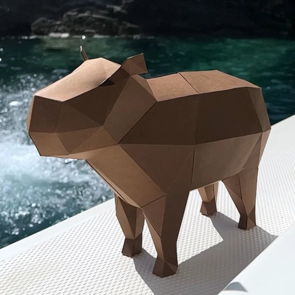 Capybara paper craft on yacht