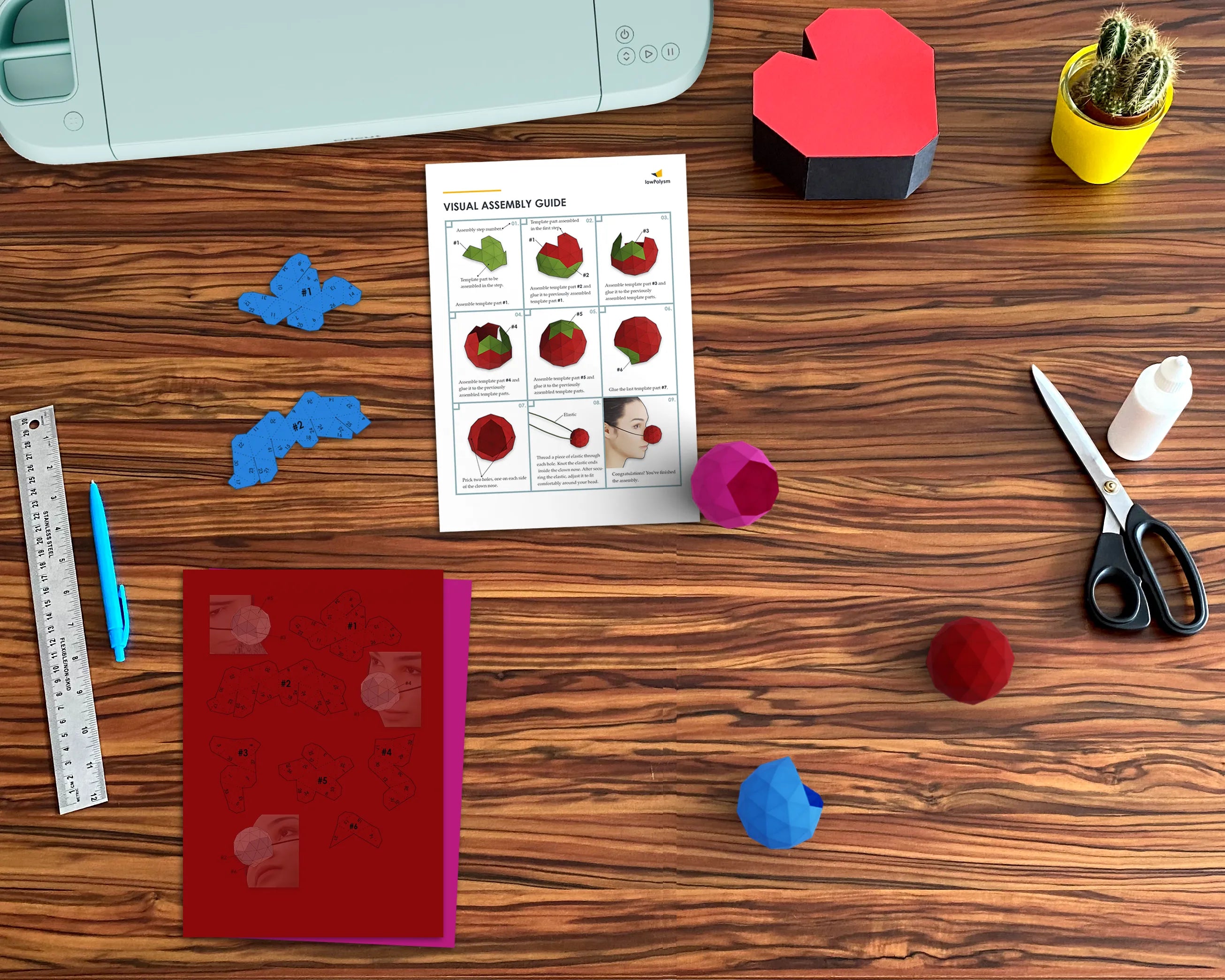 Clown Nose papercraft templates and visual assembly guide on the table.