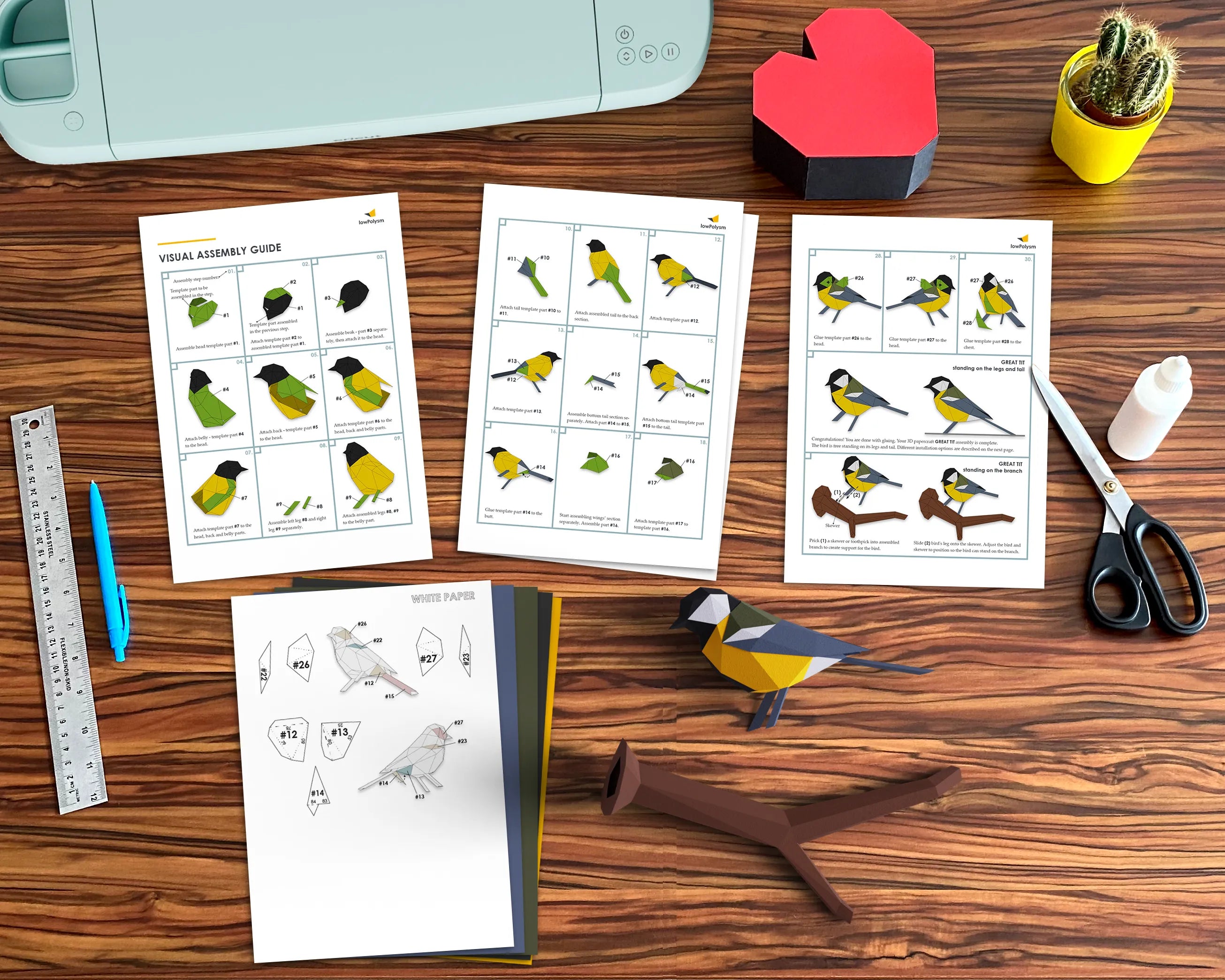 Great tit origami bird template on table with assembly guide