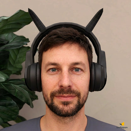 3D papercraft devil horns accessory for gaming headsets, shown in black as a DIY printable headphone attachment.