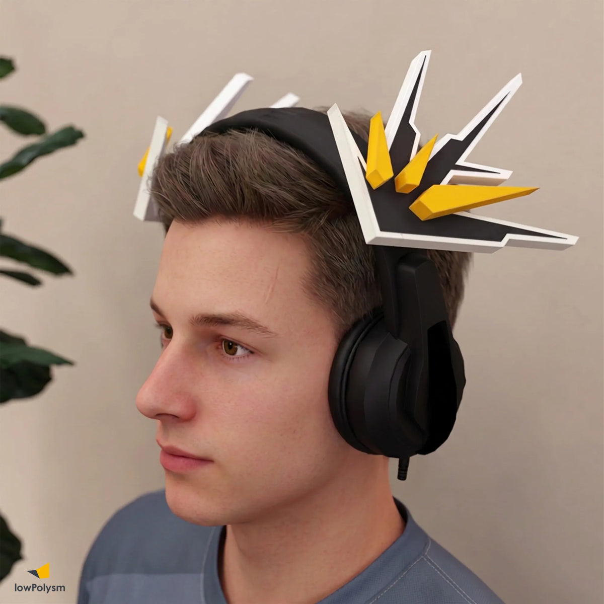 Male gamer wearing black gaming headset decorated with lowpoly yellow and black MECHA WINGS 3D papercraft attachment.