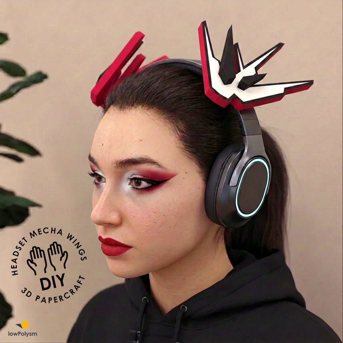 Girl gamer wearing white headset styled with white, red, and black papercraft MECHA WINGS.