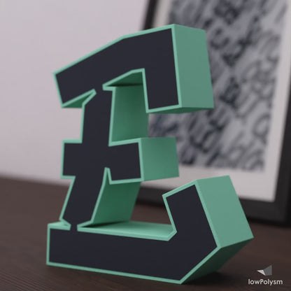 Graffiti paper 3d letter E made from free PDF template on sideboard