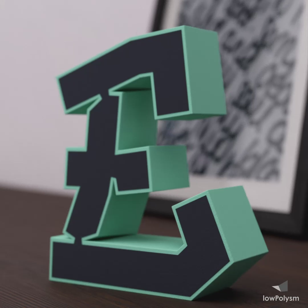 Graffiti paper 3d letter E made from free PDF template on sideboard