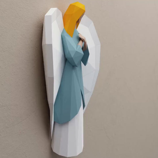 lowPolsym angel 3D paper craft holiday wall decoration from multiple angles