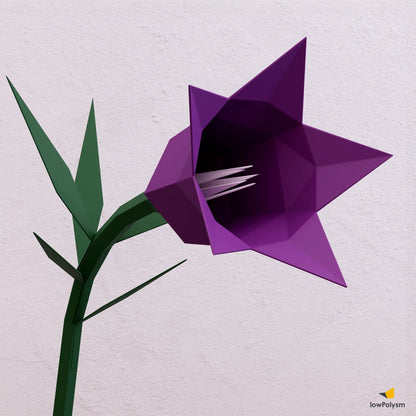 Close-up view of a purple 3D papercraft bellflower showing geometric low-poly details and the internal flower elements.