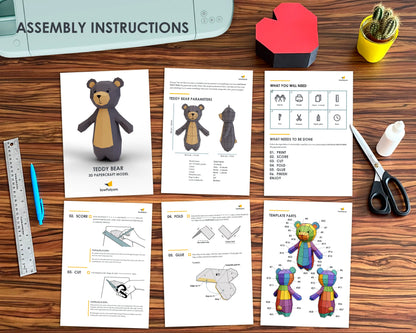 Teddy bear 3d paper craft assembly instructions on table
