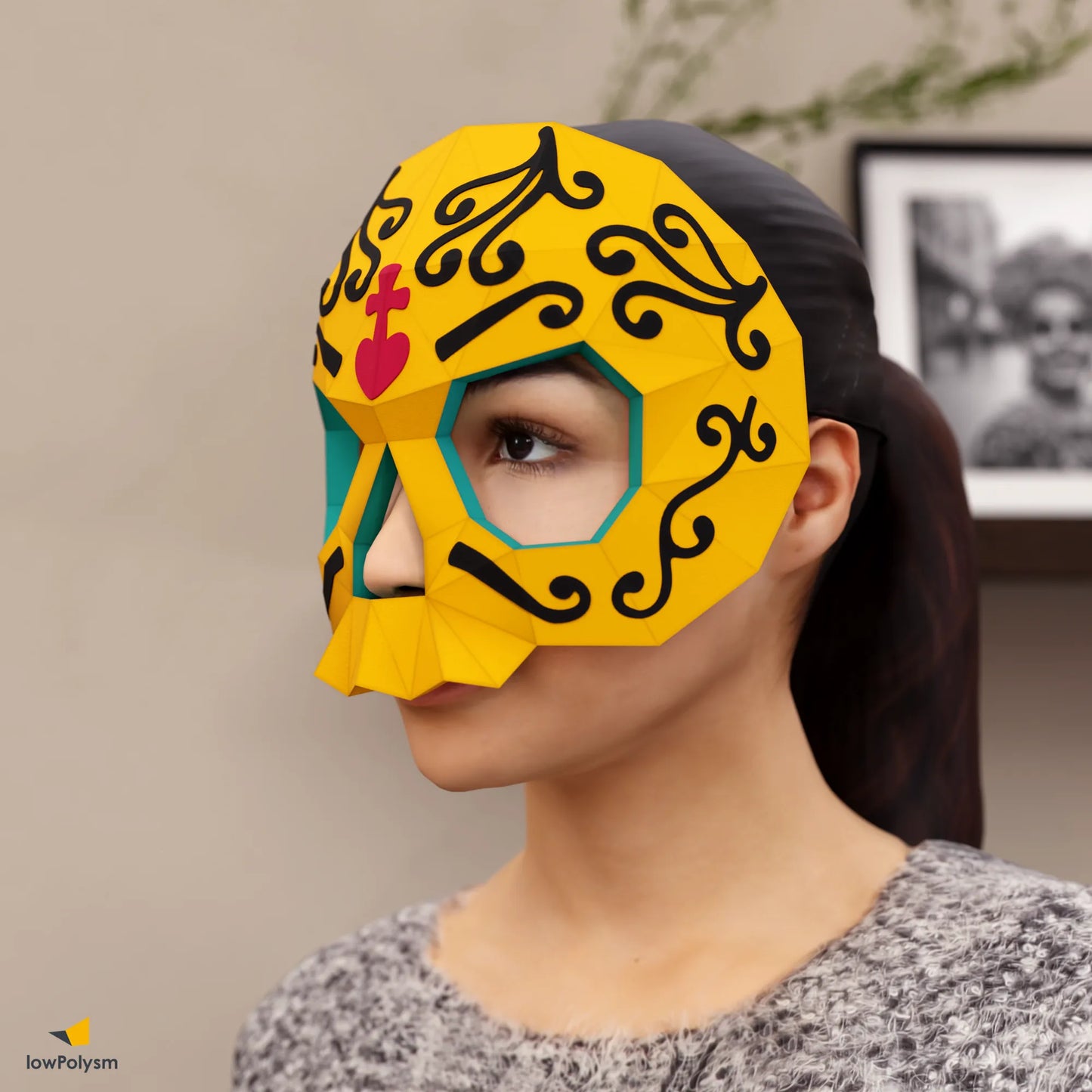 Yellow Día de los Muertos sugar skull mask created from printable 3D papercraft template
