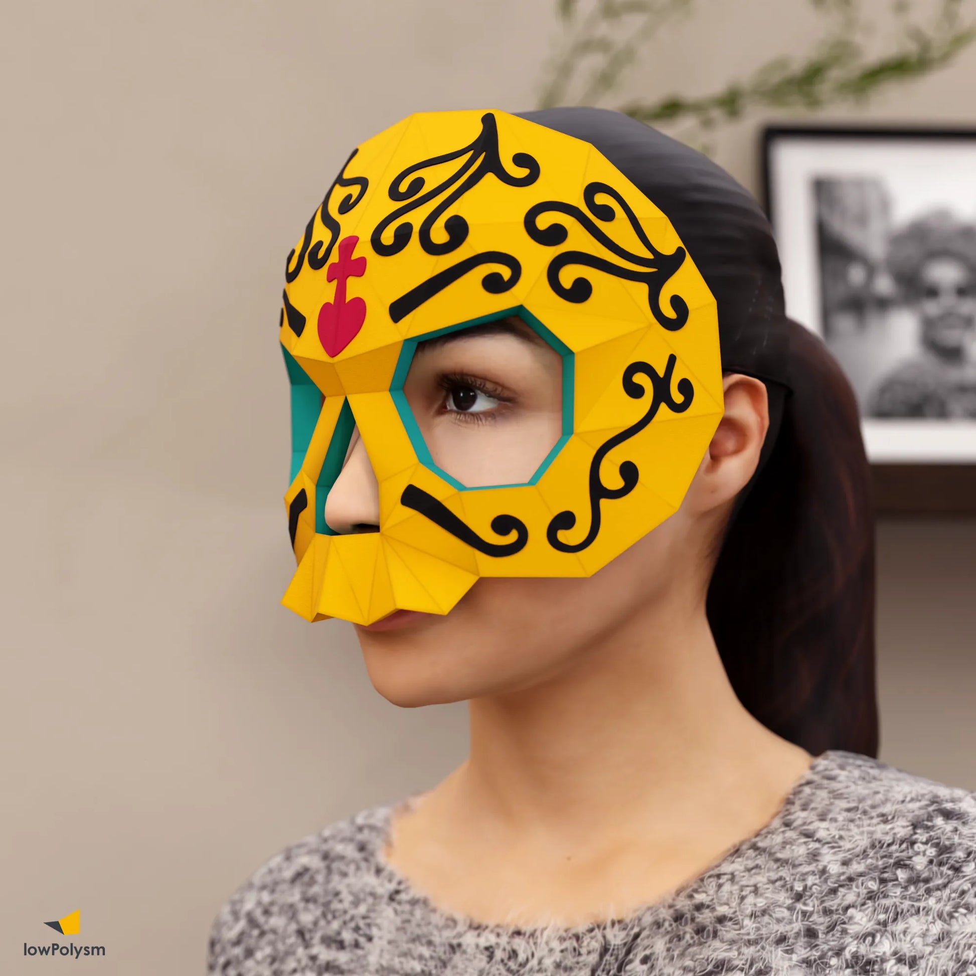 Yellow Día de los Muertos sugar skull mask created from printable 3D papercraft template